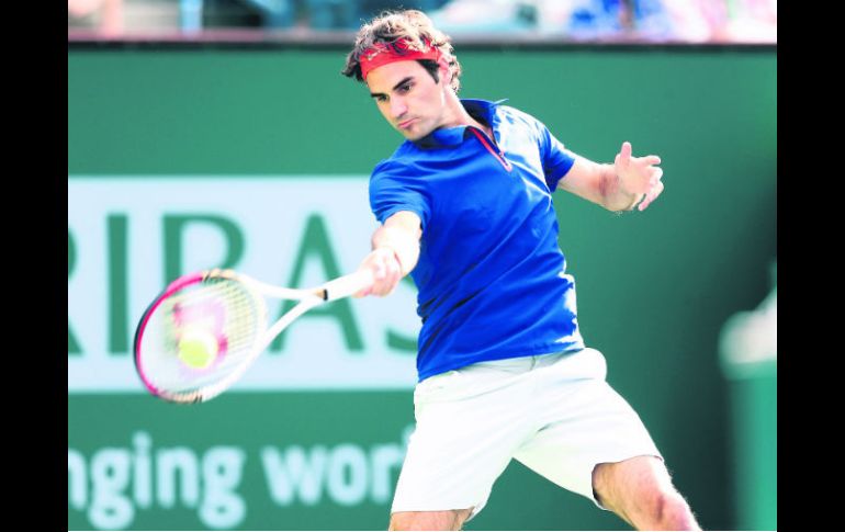 Convincente. Roger Federer pasó por encima de Denis Istomin en su debut en el certamen californiano. AFP /