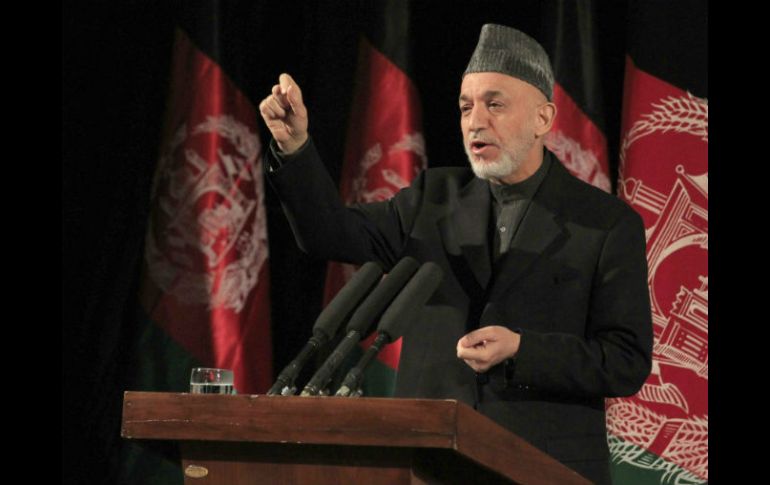 Karzai asevera que hay una alianza entre las tropas estadounidenses y talibanes. AFP /