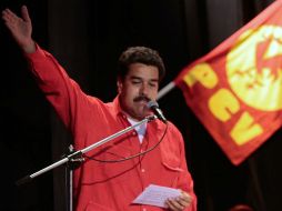 Nicolás Maduro saludó a todos los presentes a la sede del Partido Comunista de Venezuela AFP /