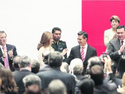 Festejo. Enrique Peña Nieto ofreció un mensaje en Palacio Nacional con motivo de sus primeros 100 días de Gobierno. EFE /