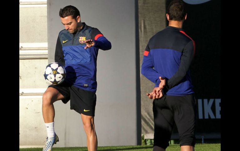 El centrocampista del FC Barcelona Xavi Hernández entrena hoy en la Ciutat Esportiva Joan Gamper. EFE /