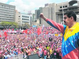 Nicolás Maduro tiene la firme voluntad de cumplir el último deseo del presidente Hugo Chávez, al dejarlo como su heredero político. AFP /