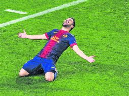 David Villa anotó el tercer tanto de ayer, que prácticamente definió la eliminatoria del Barcelona. AFP /