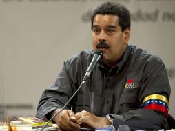 Nicolás Maduro bromeó con que la elección del cardenal argentino fue obra de Chávez. AFP /