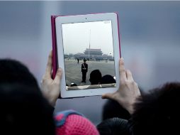 Las tabletas ofrecen la posibilidad de contar con más espacio para actividades laborales o creativas, aunque no tiene línea telefónica. AP /