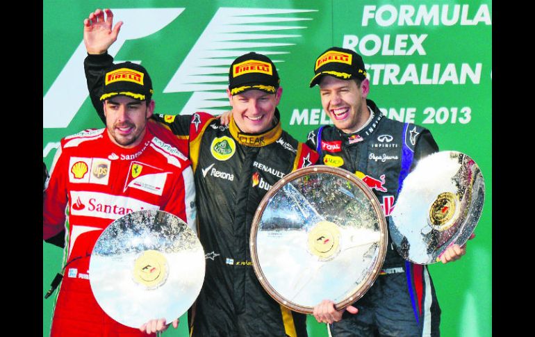 Alonso, Räikkönen y Vettel, que ya han sido campeones de la Fórmula Uno, compartieron el podio en Melbourne. AFP /