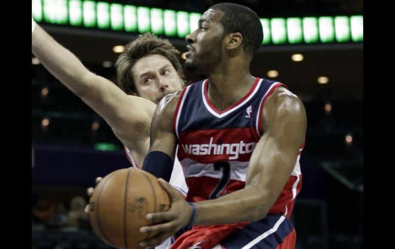 John Wall tuvo su mejor producción ofensiva en la actual temporada al anotar 29 puntos. AP /