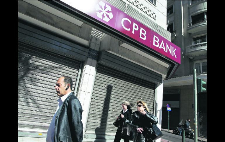 Reajuste. La banca chipriota será sometida a un programa de reordenamiento. EFE /