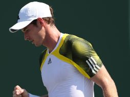 Andy Murray, de la Gran Bretaña, celebra un punto contra Bernard Tomic. AFP /