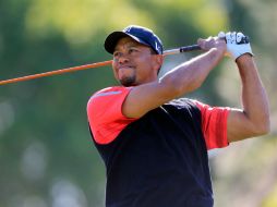 Woods consigue la victoria 77 en en el PGA Tour y regresa al sitio de honor. AFP /