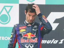 El rostro de Webber durante la premiación en Malasia reflejaba molestia y decepción. EFE /