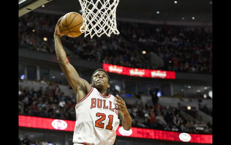 El jugador de los Bulls de Chicago, Jimmy Butler, aportó 16 tantos. EFE /