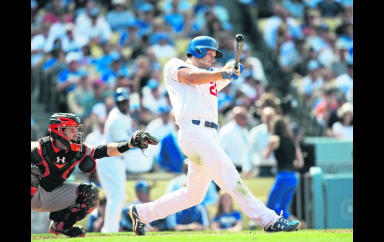 Otra faceta. El lanzador Clayton Kershaw conecta el primer cuadrangular de su carrera. AP /