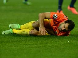 Javier Mascherano al momento de su lesión. AFP /