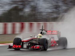 Sergio Pérez debe mejorar en sacarle jugo al bólido de McLaren. AP /