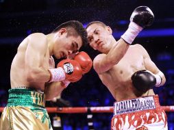 Juan Francisco Estrada (der) fue mejor en el combate ante el filipino Viloria. AFP /