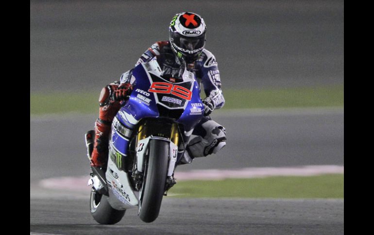 Jorge Lorenzo a bordo de la Yamaha se queda con la primera carrera de la temporada. AP /