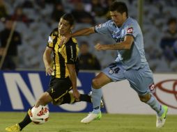 El encuentro contra Iquique se caracteriza por las imprecisiones permanentes de los futbolistas de Peñarol. AFP /