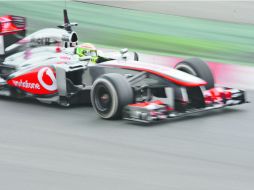 Desafío. McLaren acumula sólo cuatro puntos tras dos carreras, dos de Checo Pérez (foto) y un par de Jenson Button. AP /