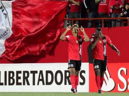 Fidel Martínez y Duvier Riascos celebran el gol del triunfo. AFP /