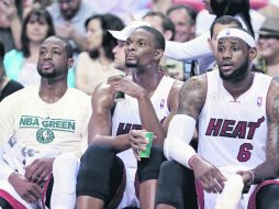 Las figuras del Heat de Miami,  Dwyane Wade, Chris Bosh y LeBron James volvieron a jugar juntos. AP /