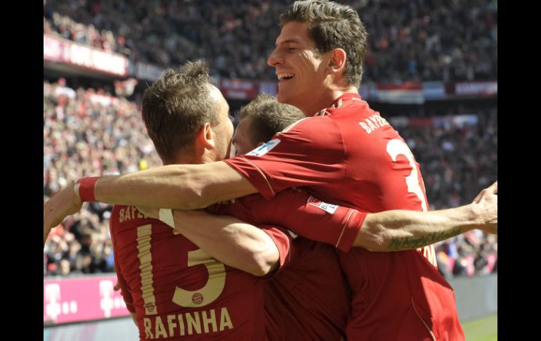 Jugadores del Bayern Munich celebran uno de los goles en contra del Nuremberg. AFP /