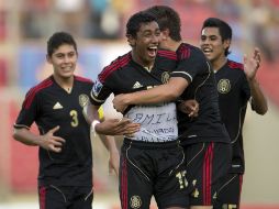 Marco Antonio Granados (centro) llegó a cuatro goles en el torneo. MEXSPORT /