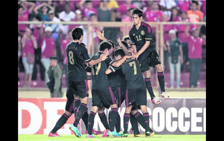 Festejo. Los jugadores mexicanos festejan el triunfo sobre los panameños. MEXSPORT /