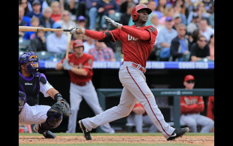 El parador en corto Didi Gregorius pega de cuatro esquinas en el quinto episodio contra el abridor dominicano Juan Nicasio. AFP /