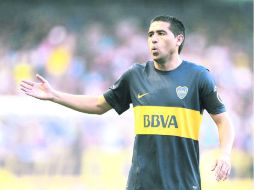 El veterano Juan Román Riquelme no puede ''echar a andar'' la maquinaria del Boca. AFP /