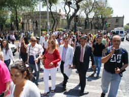 Los servidores públicos de las distintas oficinas salieron rumbo a la Rotonda de los Jalisciense Ilustres.  /