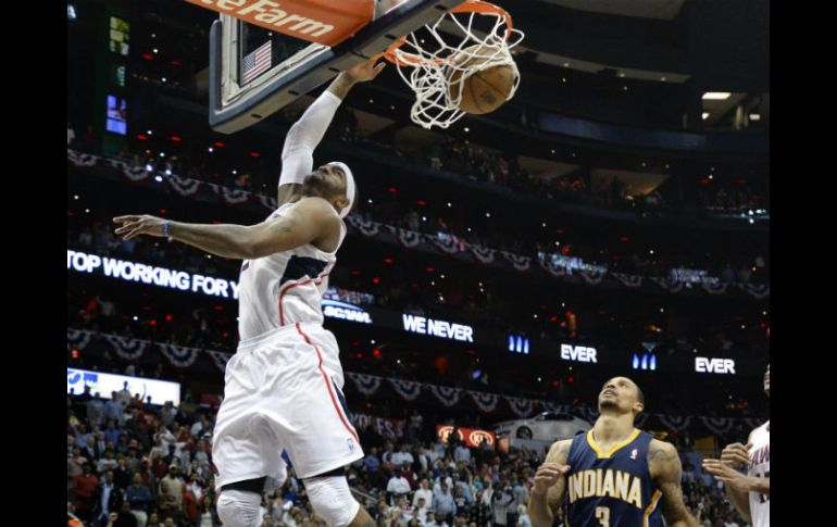 Josh Smith aporta 29 puntos al triunfo de los Hawks. EFE /