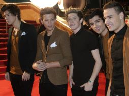 One Direction se encuentra conmocionado por la muerte de su fan número uno. ARCHIVO /