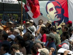 En la manifestación exponen casos de migrantes. AFP /