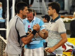 El búlgaro Grigor Drimitov supera al tenista número uno del mundo, Novak Djokovic, por 7-6 (6), 6-7 (8) y 6-3. AFP /