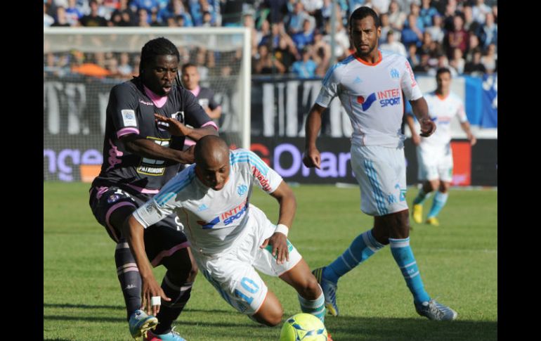 El franco ghanés André Ayew marca dos goles y lleva al triunfo al Marsella. AFP /