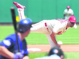 Adam Wainwright cubrió la ruta completa, recibió dos imparables, ponchó a siete y dio sólo una base por bolas. AFP /