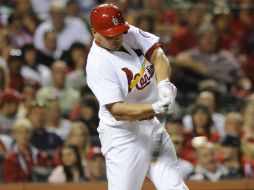 El toletero Matt Holliday logra un jonrón de dos carreras en un séptimo inning de tres anotaciones. AP /