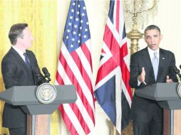 David Cameron (izquierda), dialoga con Barack Obama, para conseguir una salida política a la crisis siria. EFE /