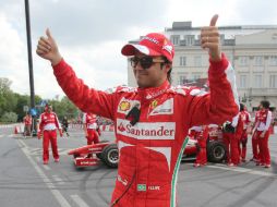 Felipe Massa subió al podio en la última carrera en España. EFE /