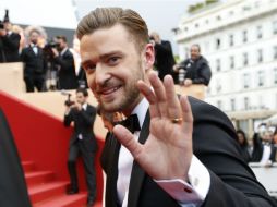 El cantante y actor Justin Timberlake provocó la locura adolescente a su llegada al festival. AFP /