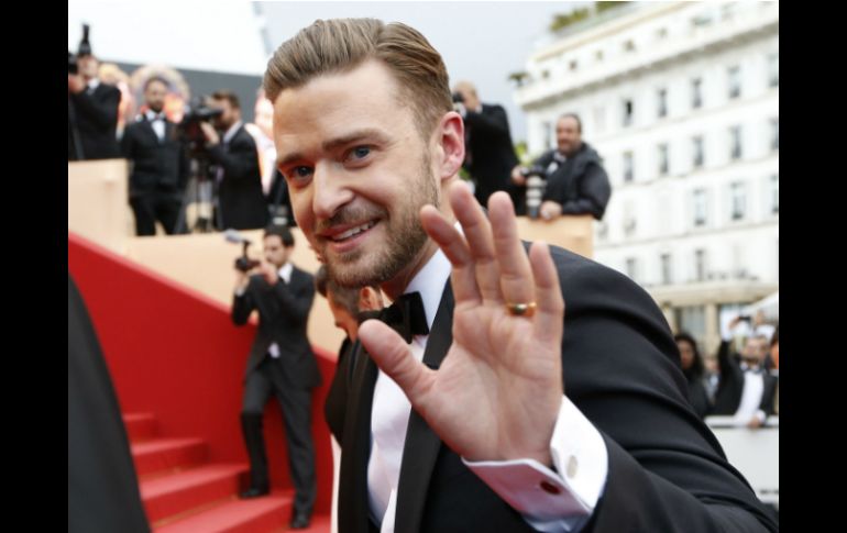 El cantante y actor Justin Timberlake provocó la locura adolescente a su llegada al festival. AFP /