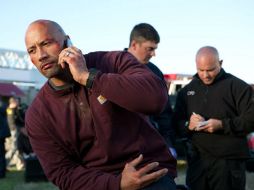 Dwayne ''The Rock'' Johnson encarna a un detective que sigue la pista de unos pilotos mercenarios. ARCHIVO /