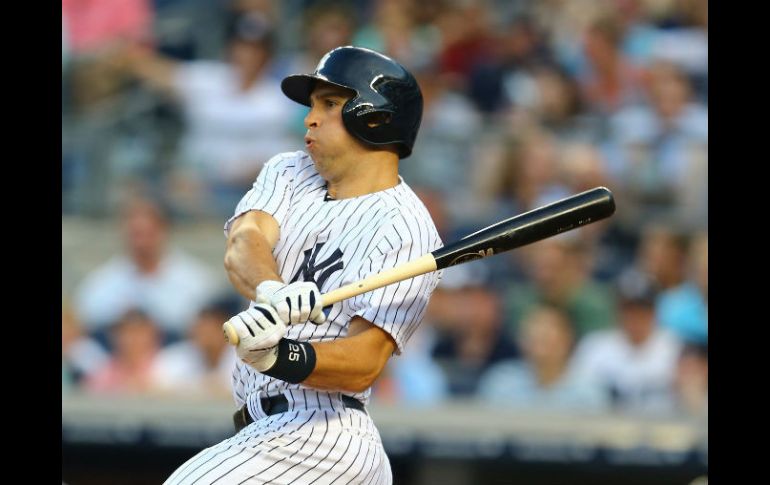 Los Yankees ganan con un jonrón de Mark Teixeira. AFP /