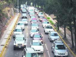 Avenida Patria. Intenso congestionamiento vial se registró a la altura del Bosque Los Colomos por la manifestación de los trabajadores. EL INFORMADOR /