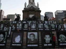 Manifestantes, en el Ángel de la Independencia, reclaman justicia por la muerte, hace cuatro años, de 49 niños en la Guardería ABC. NTX /