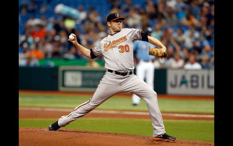 El abridor Chris Tillman lleva a los Orioles de Baltimore a la victoria. AFP /