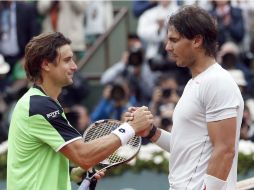 David es superado por Rafael en Roland Garros, sin embargo el llegar a la final le permite ''brincarlo''. EFE /