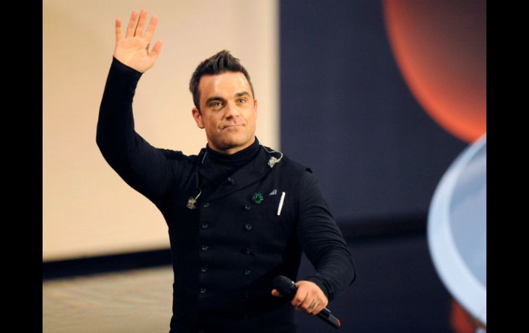 Robbie Williams se encuentra en la gira promocional de su más reciente álbum ''Take the crown''.  /