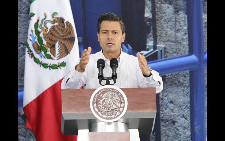 Enrique Peña Nieto se reunirá con banqueros y empresarios para ampliar la relación con ambos países. ARCHIVO /